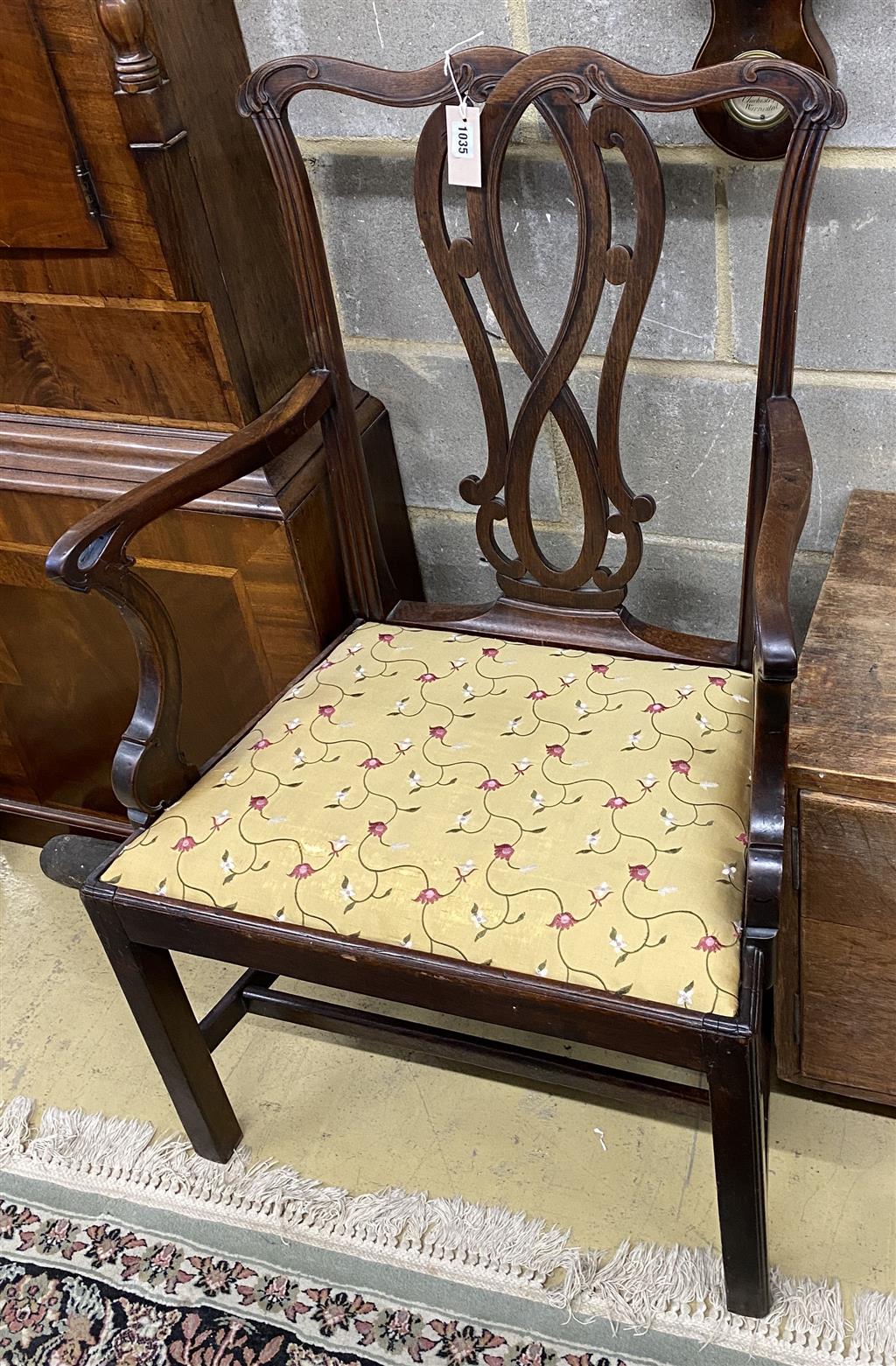 A George III Hepplewhite style mahogany elbow chair